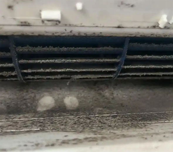 弓长岭空调吹的风有股烧焦味是怎么回事